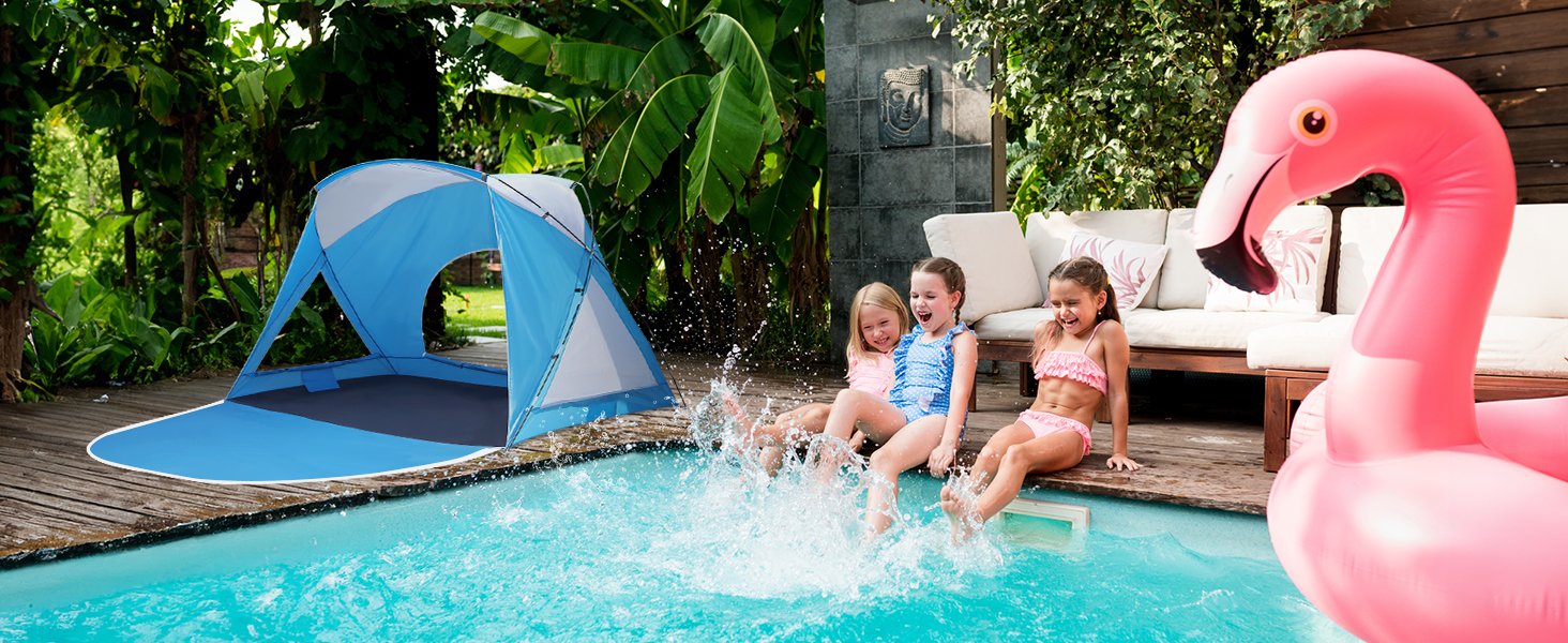 Three children playing next to the tent in the swimming pool